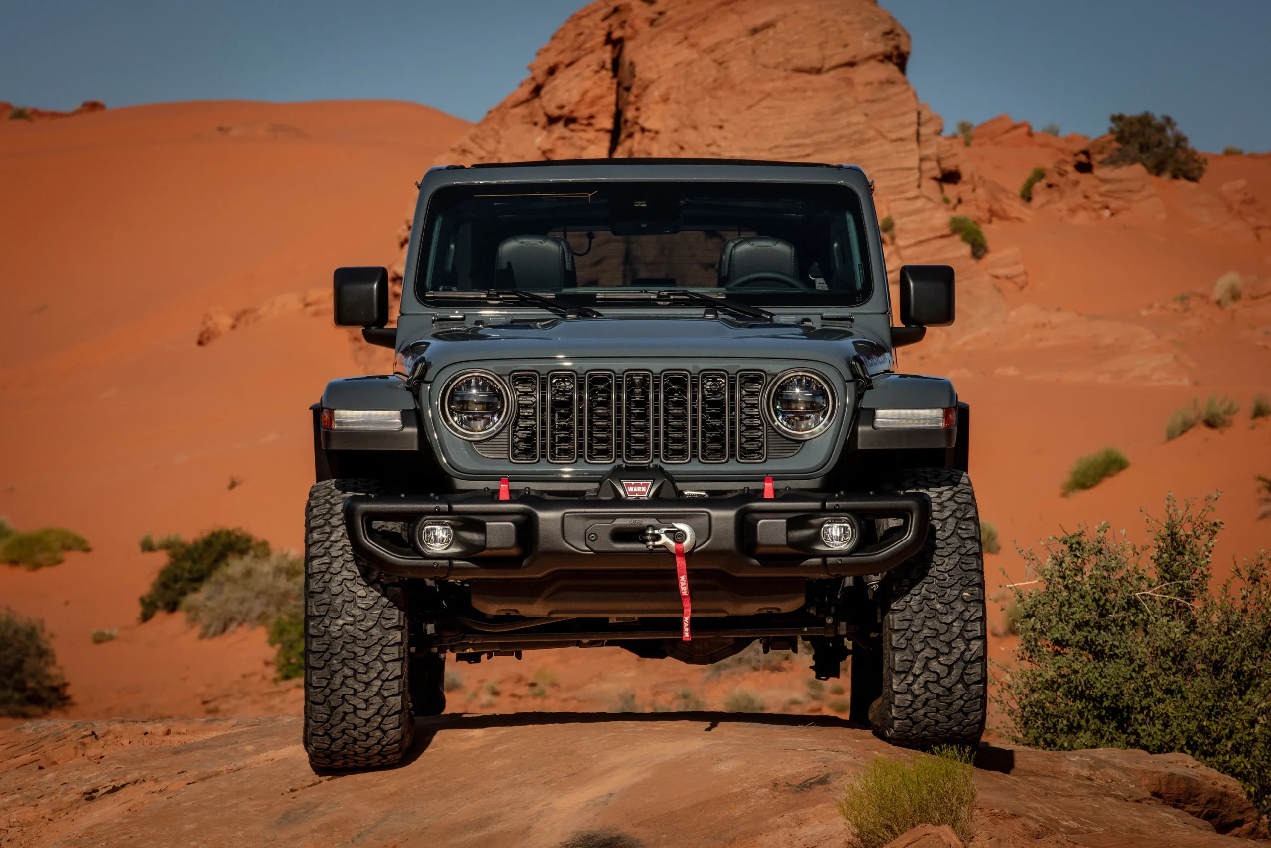 2024 Jeep Wrangler Rubicon front quarter view showcasing bold off-road styling and rugged capability