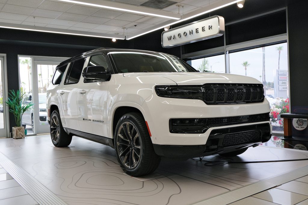 Jeep Wagoneer at Tustin Chrysler Dodge Jeep Ram White Jeep Wagoneer displayed inside the Tustin Chrysler Dodge Jeep Ram showroom