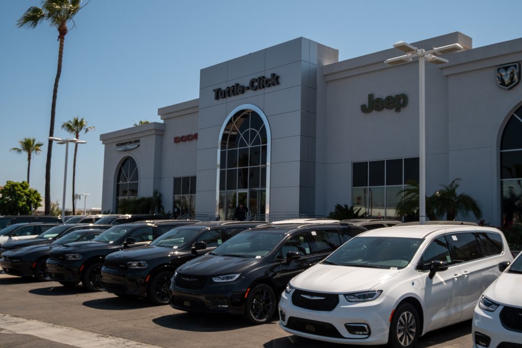 Tustin CDJR dealership exterior Tustin Chrysler Dodge Jeep Ram dealership exterior with vehicle inventory